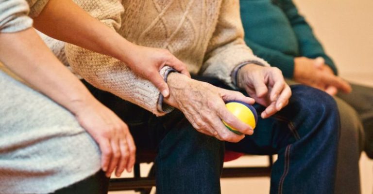 Volunteer - Person Holding a Stress Ball