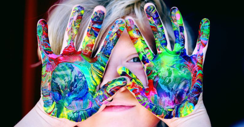 Kids - A KId With Multicolored Hand Paint