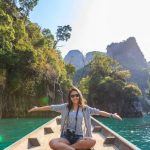 Tour - Photo of Woman Sitting on Boat Spreading Her Arms