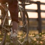 Biking - Person Riding Bicycle Near Fence