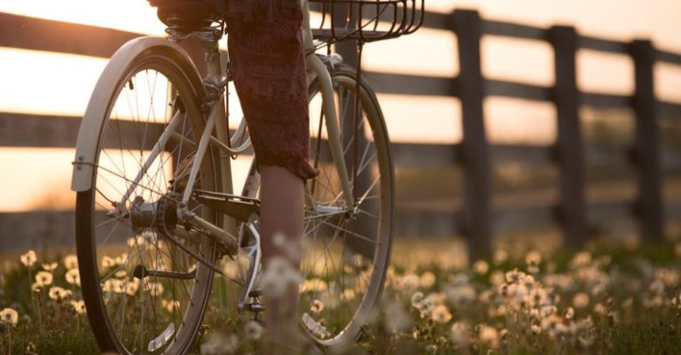 Biking - Person Riding Bicycle Near Fence