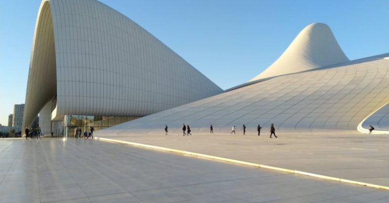 Cultural Centers - Photo of People Walking Near Building