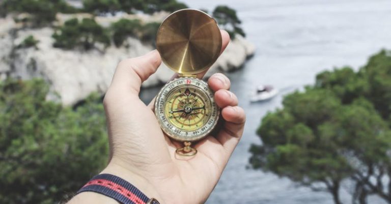 Tours - Person Holding Compass